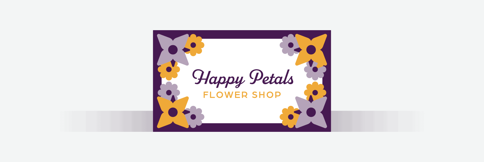 Business card with a dark purple frame and flowers